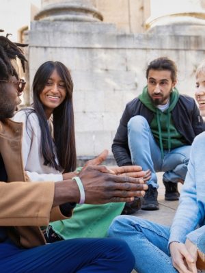 Group,Of,Diverse,Young,Adults,Engaging,In,conversation, symbolising community engagment